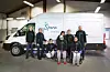 Øyane ASVO får nytt namn og ny logo. Her er den nye logoen på bilen bak. F.v.: Steinar Sørheim, Sollaug Eljervik, Britt Elin Johannessen, Aminda B. Hardeland, Magne Berge, Paul Fuglestein. Framme f.v: Vanja Mikkelsen og Tone Gullhaug. Foto: Privat