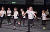 Gruppa Dans 7-9 år med fletter i håret og fengande oppvisning. Frå h. Rikke Sævareid, Karina ?, og Lykke Øren.